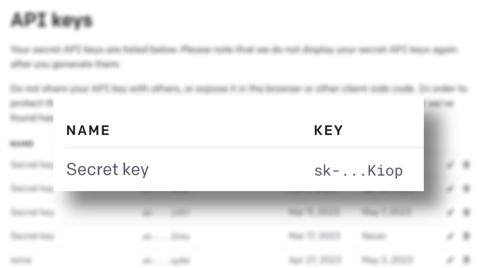 この画像は、名前、キー、秘密鍵が表示された API キーの例を示しています。全文: API キー -- NAME KEY 秘密鍵 sk -... Kiop