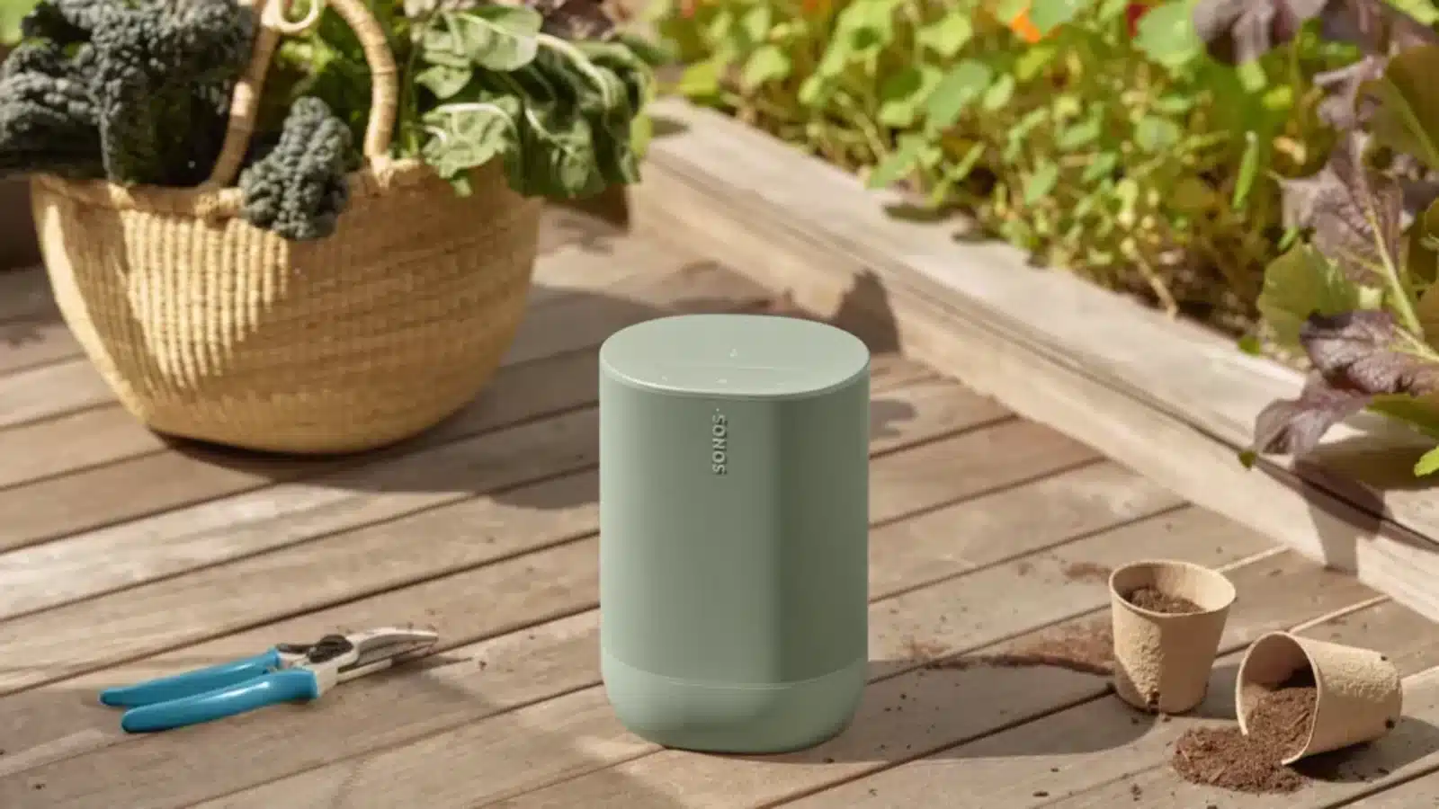 sonos move 2: sonic leap forward atau sekadar speaker portabel lainnya? 7 Sonos move 2 in olive sitting on a wooden deck near a planter