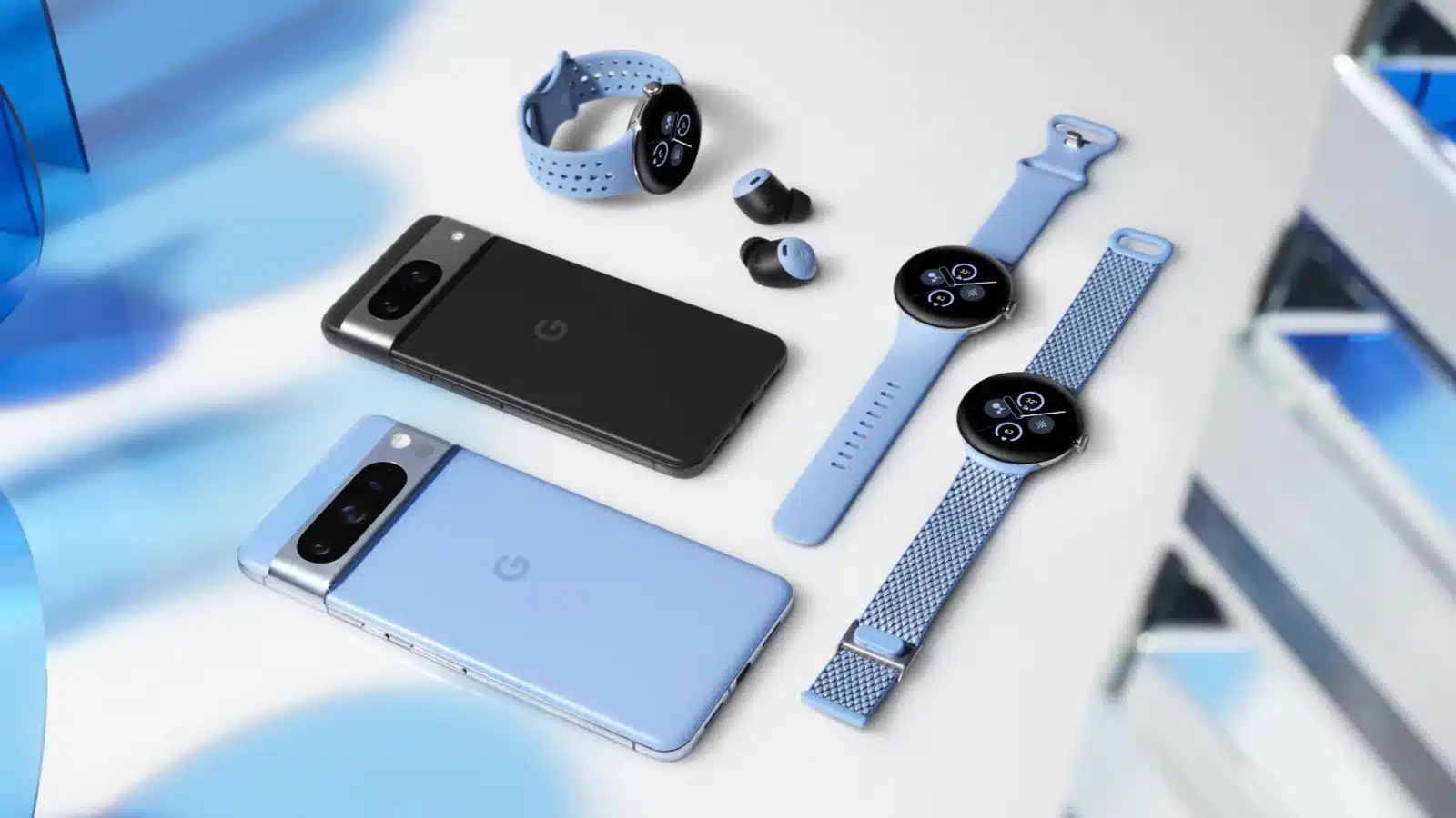 ile kosztuje piksel Google 8? A smartphone, watch, and other everyday carry electronic devices are displayed on a gadget-filled indoor surface.