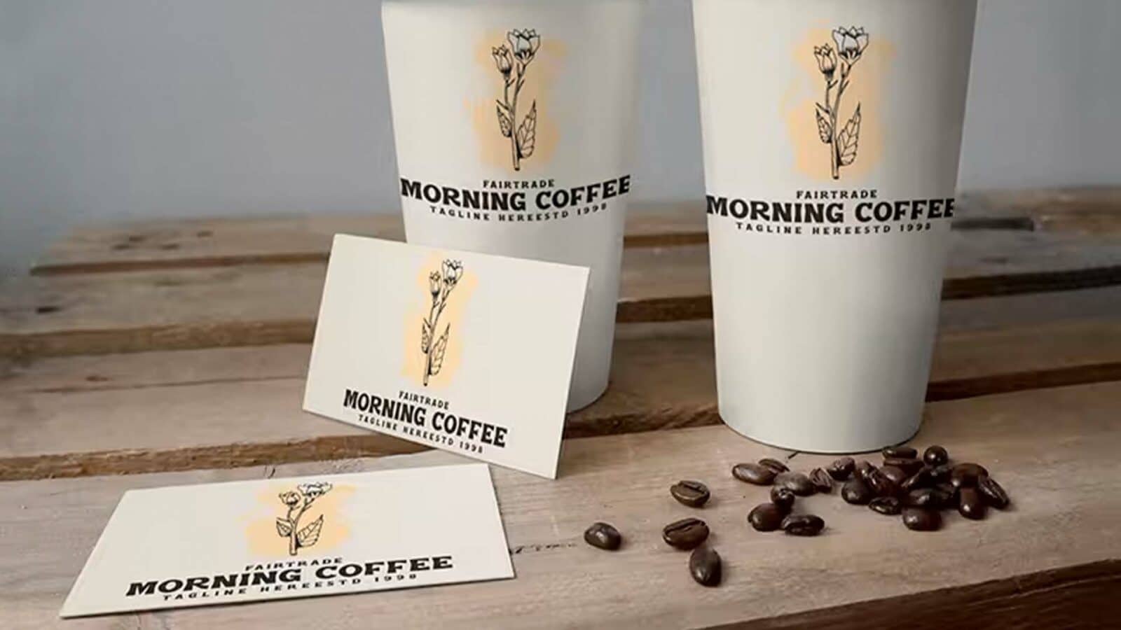 Logo designed on a coffee cup and business card.