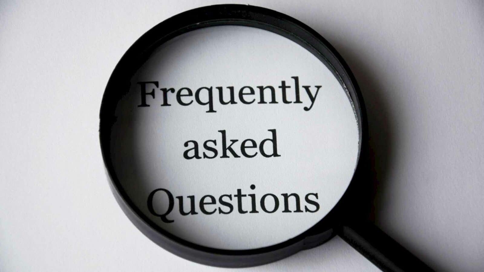 Frequently asked questions with a magnifying glass