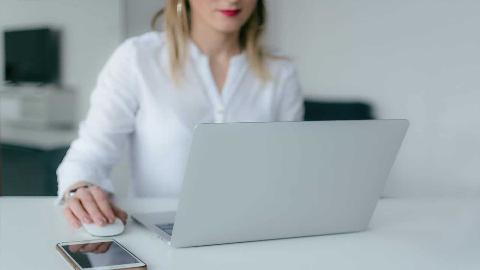 Woman working on her laptop.