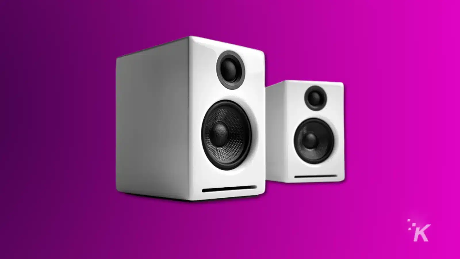 i migliori altoparlanti da gioco (2024) Render of audioengine a2+ white speakers on a purple background