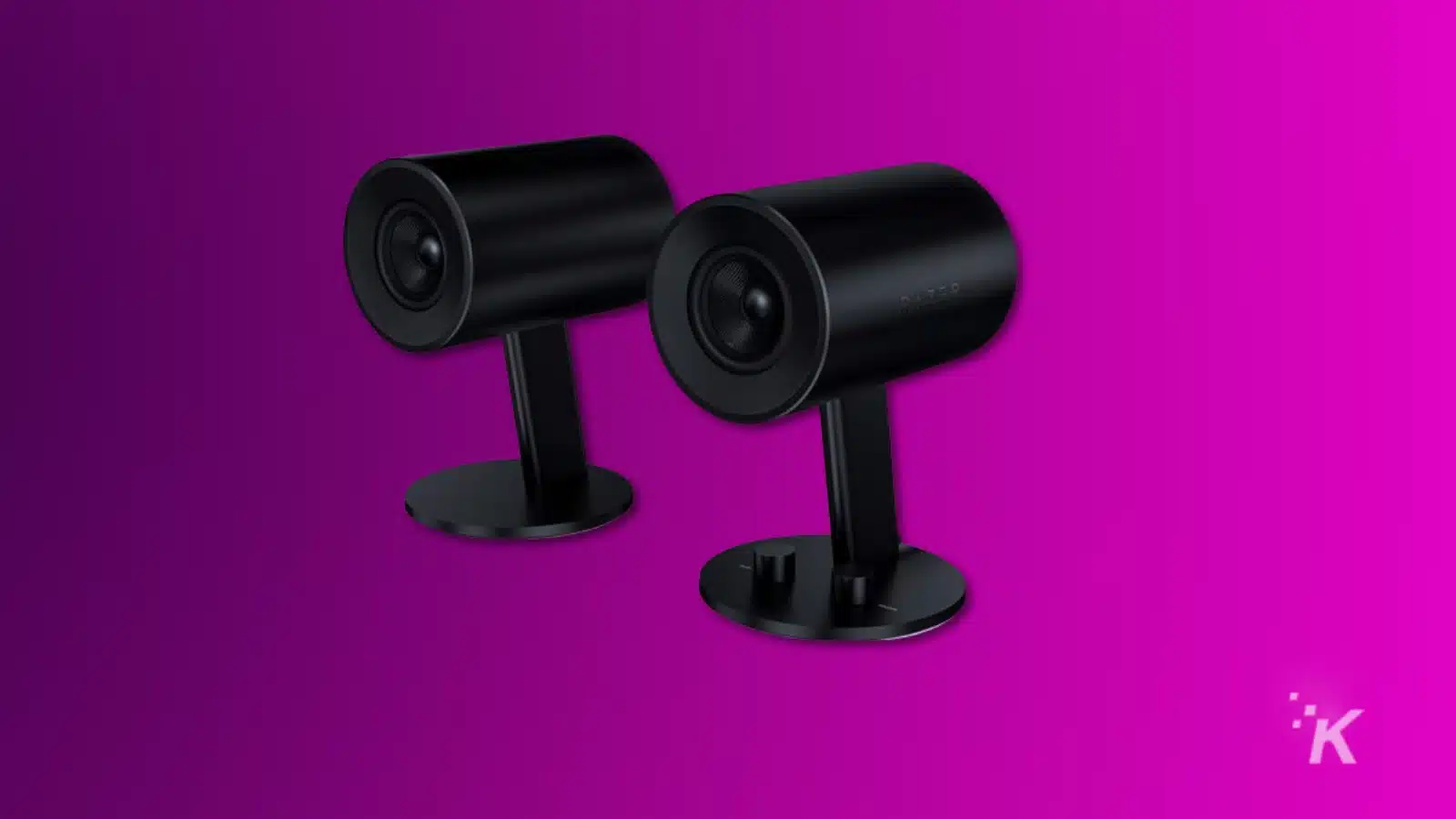 Render of razer nommo chroma speakers on a purple background