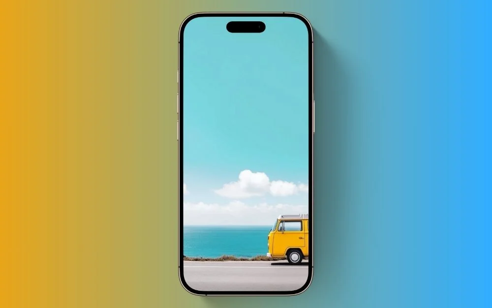 yellow van by the ocean lock screen wallpaper