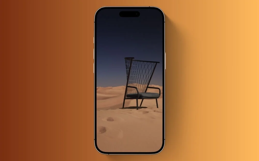 chair in the desert lock screen wallpaper